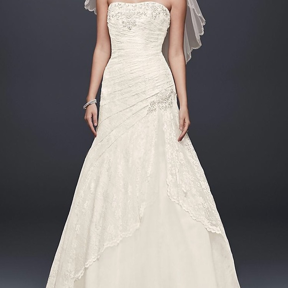 David's Bridal Dresses & Skirts - New tags still on wedding dress
